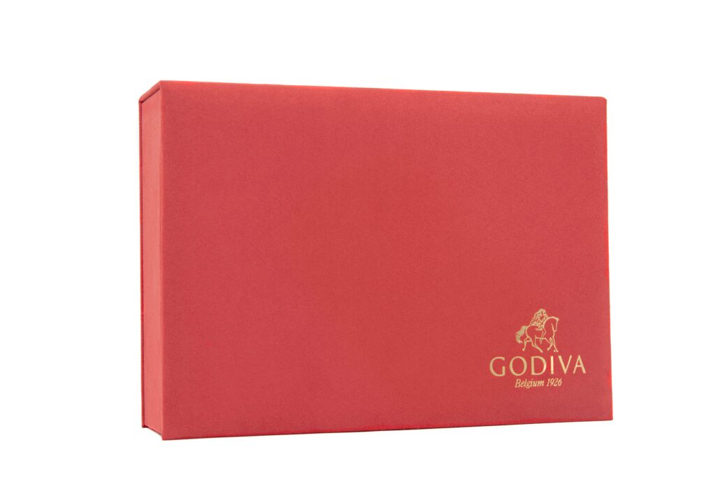 Godiva red chocolate gift box with embossed gold logo – elegant packaging photo for digital shops