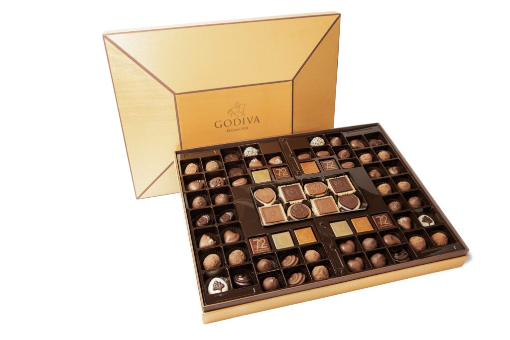 Large open Godiva gold collection chocolate box with assorted truffles – luxury gift set e-commerce photography by Food On Focus Media