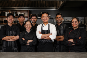 A chef and his team at a Restaurant